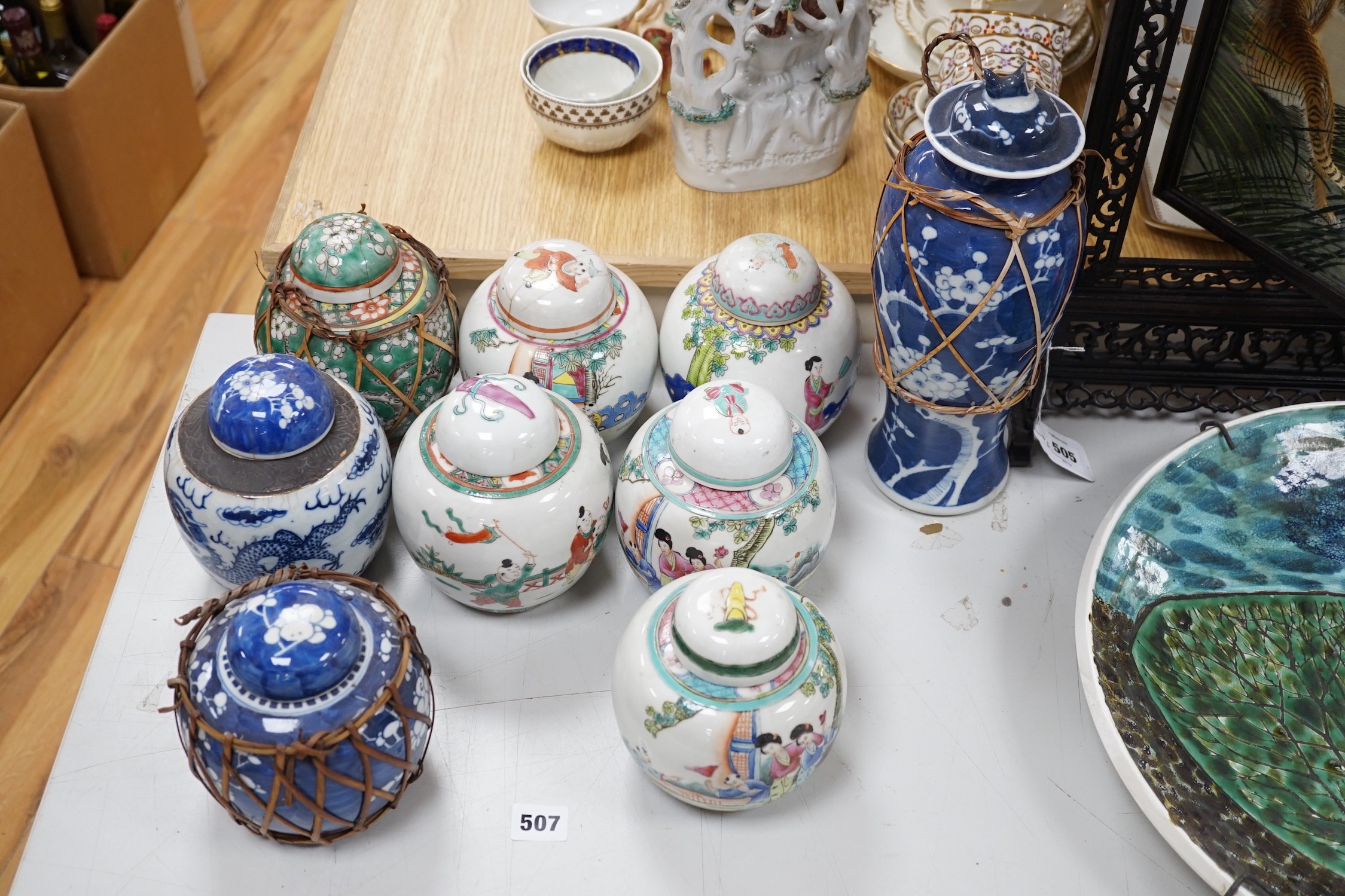 A collection of 19th and 20th century Chinese jars and covers and a blue and white vase and cover, vase 32cms high